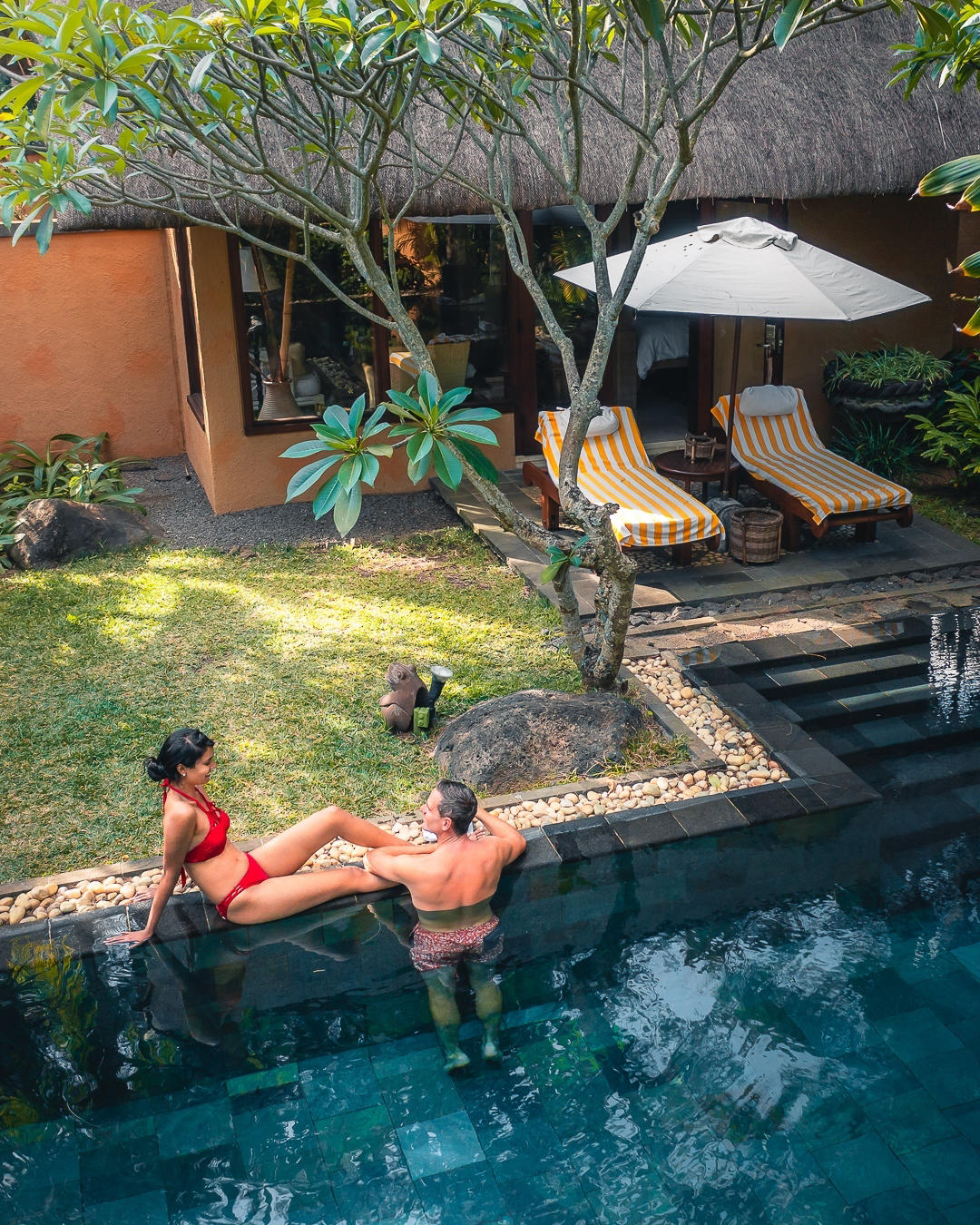 Experience the essence of intimacy and romance in the seclusion of your opulent villa's private pool